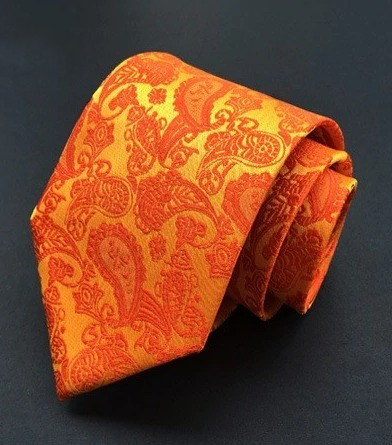 Spoločenská pánska viazanka s luxusným vzorom v pomarančovej farbe